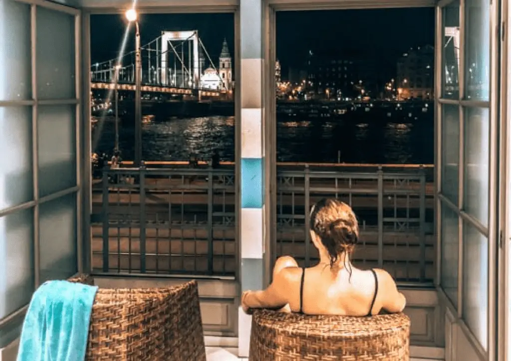 window in front of the salt room overlooking a bridge at night