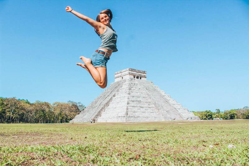 Jumping over Chichen Itza during Yucatan road trip.