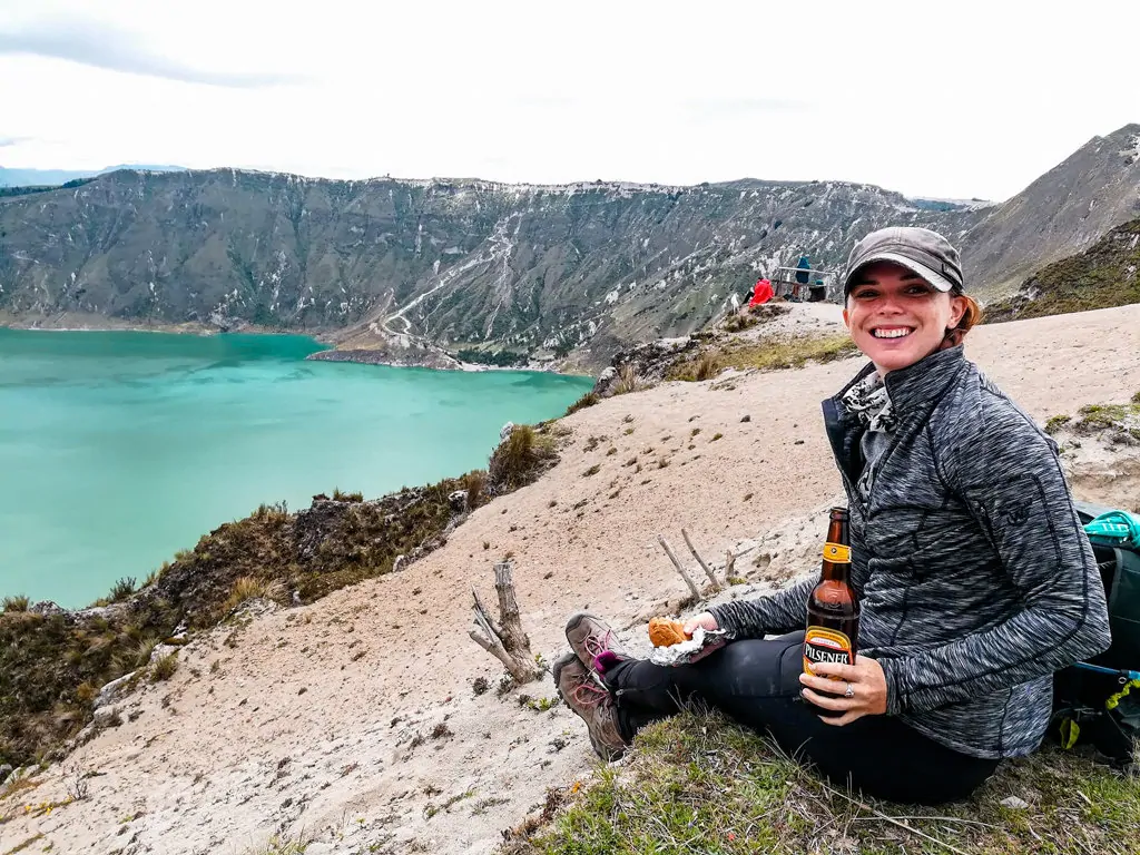 Me drinking a beer overlooking quilotoa lake