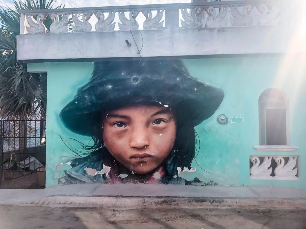 Things to do in Holbox: Holbox street art of a young girl