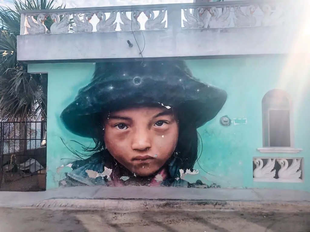 Things to do in Holbox: Holbox street art of a young girl