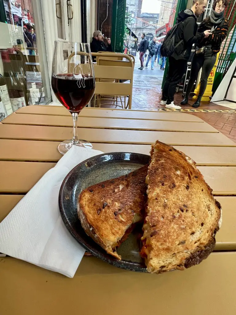 Loose Canon toastie and glass of red wine.