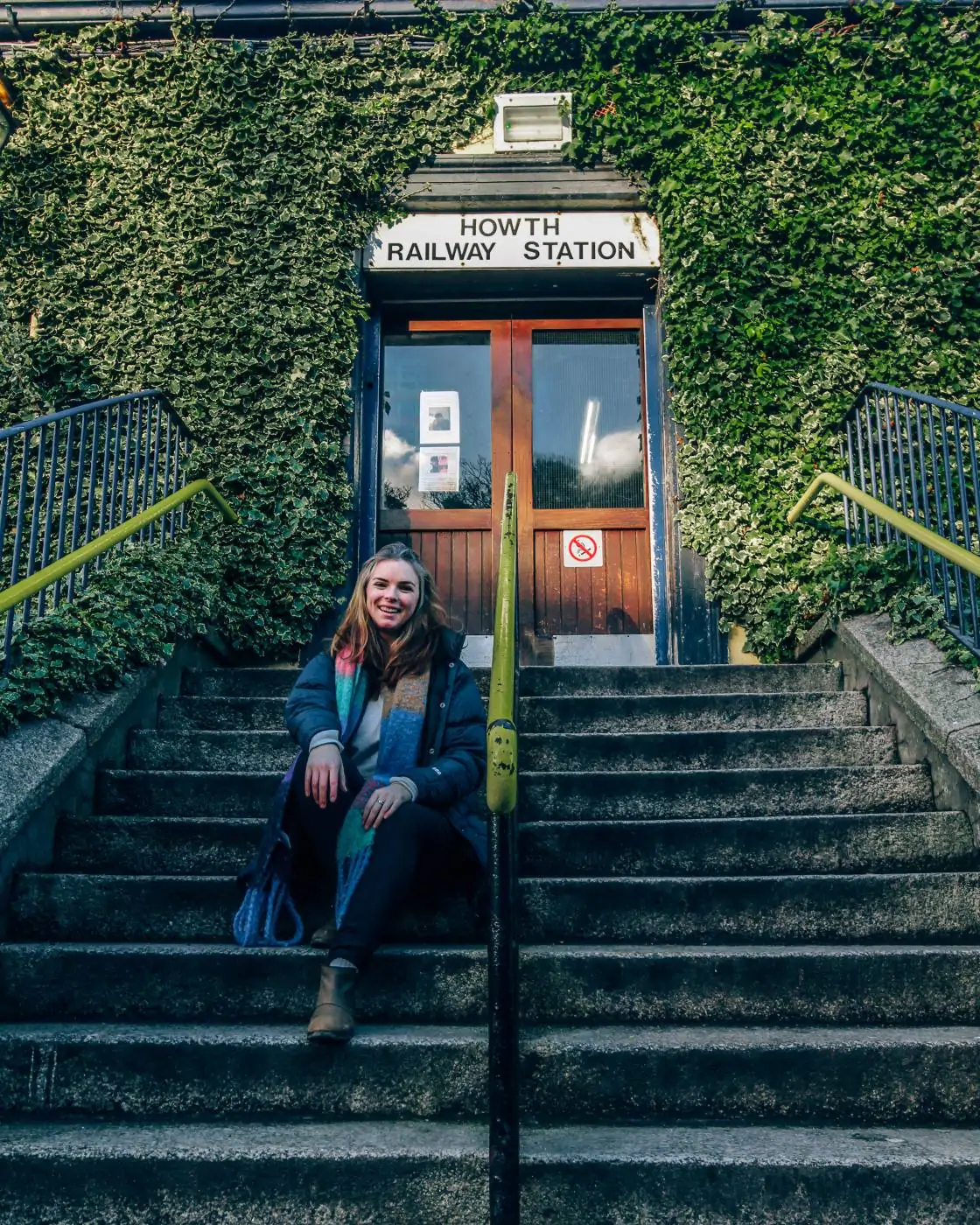 Me sitting in front of the Howth Train Station.