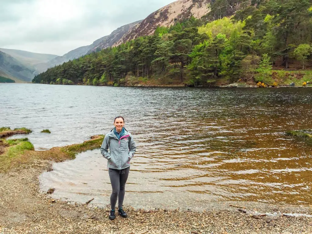 Standing in front of the lake in Glendalough Ireland. 