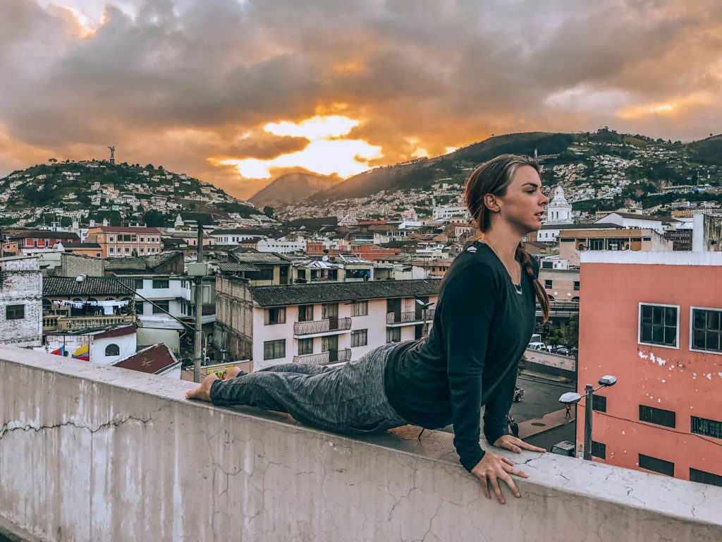 Me doing yoga at sunset in Quito