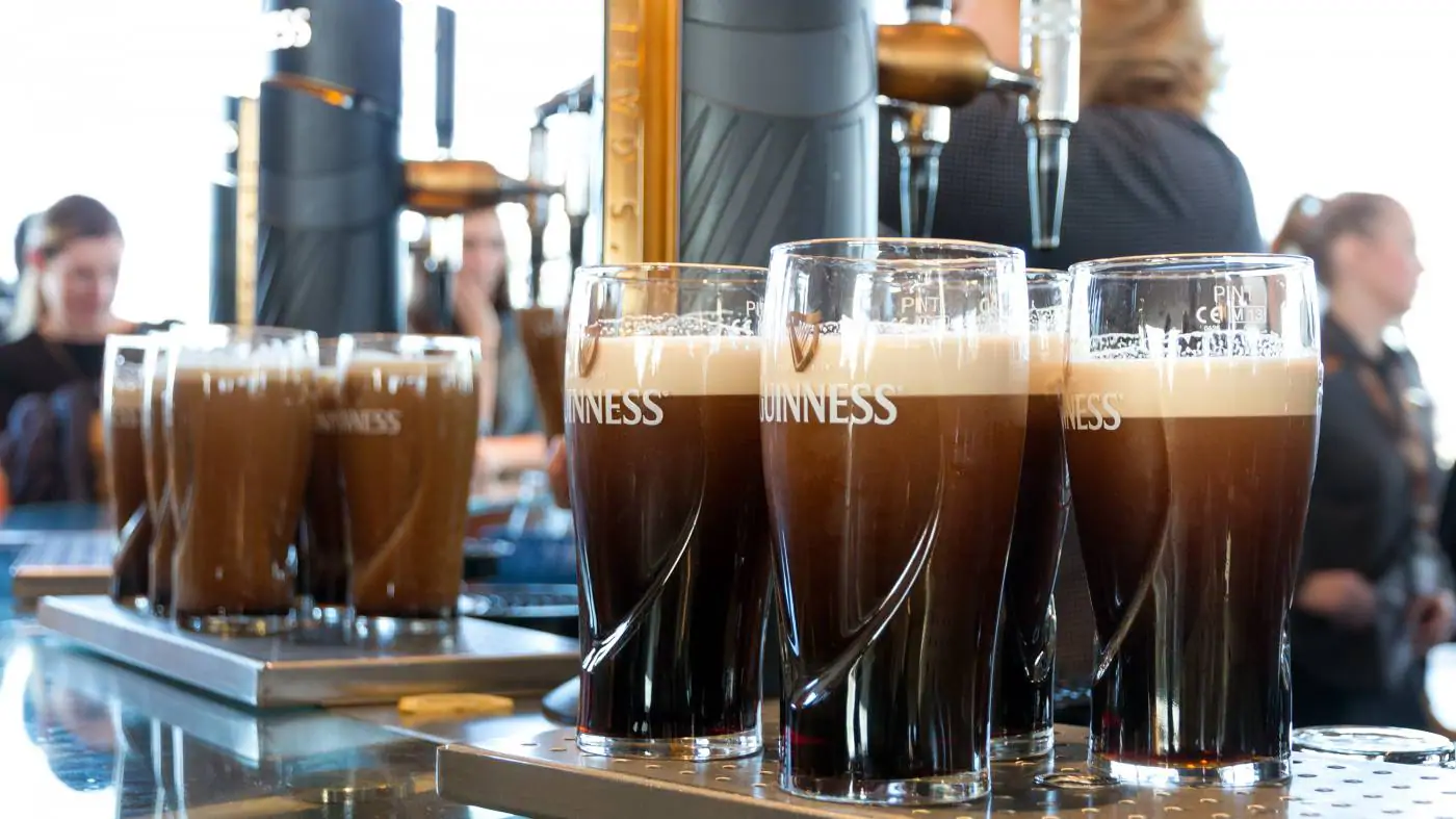 Glasses of Guinness in a bar