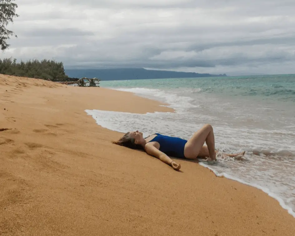 Girl laying on beach