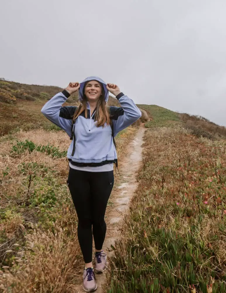 what to wear hiking in Pacifica, CA. Me walking on the Mussel Rock trail in Pacifica, CA