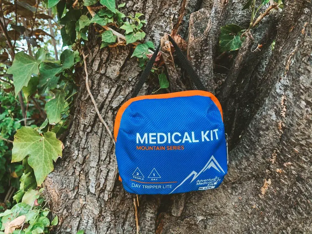 one of the top hiker essentials is a first aid kit, pictured here.