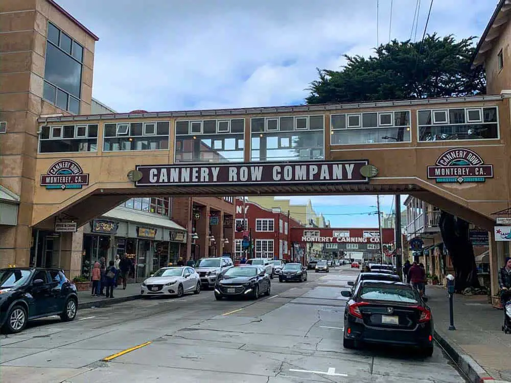 Cannery Row sign on pedestrian bridge over the main street in Monterey, California.