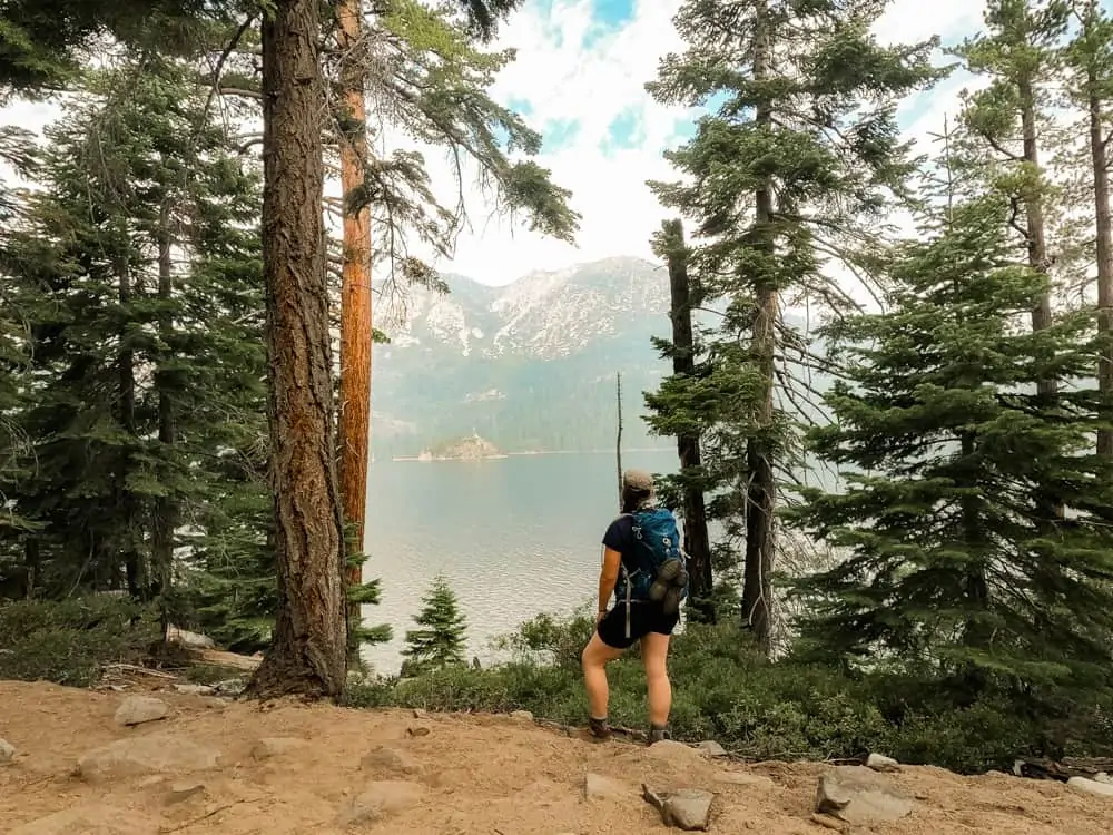 Me looking out to Fanette Island between trees from the Rubicon Trail