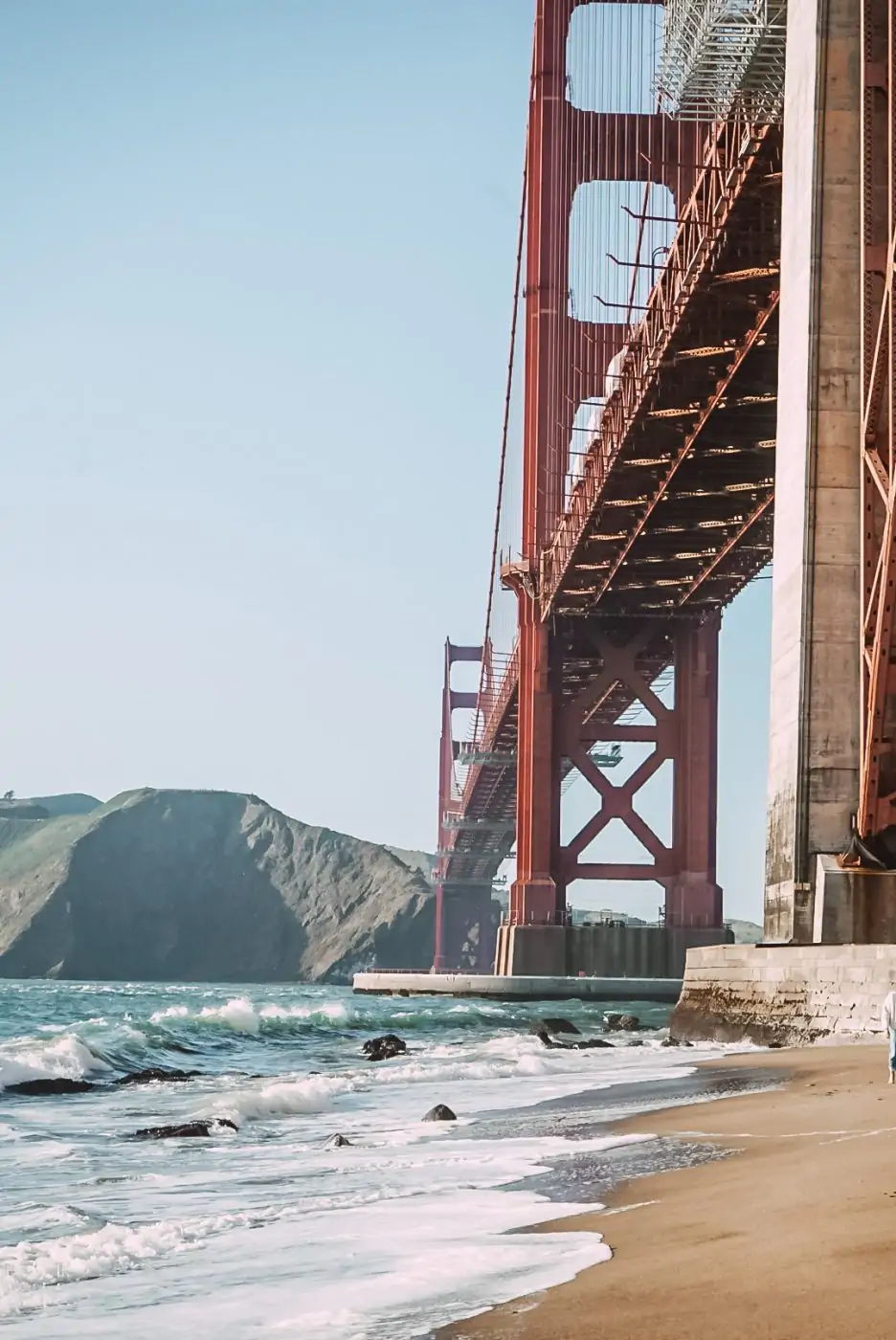View of the Golden Gate Bridge from Marshall's Beach in San Francisco, CA. 