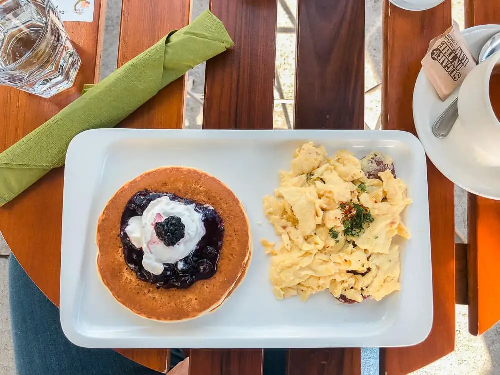 Greek yogurt pancakes and scrambled eggs with sausage from Lokma in the Richmond, San Francisco.