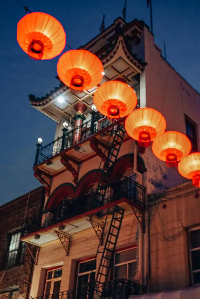 Chinese lanterns in front of a Chinese architectural building in Chinatown