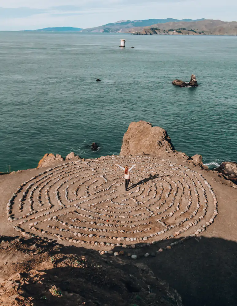 Me standing in the middle of the Lands End Labyrinth a great San Francisco photography spot.