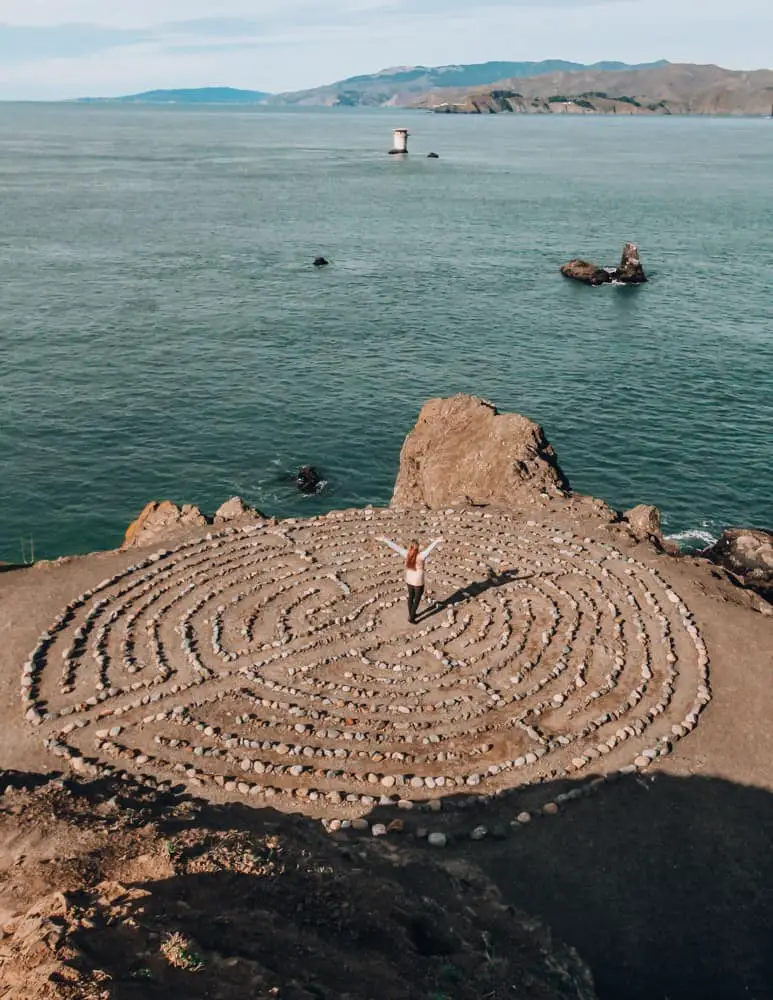 Me standing in the middle of the Lands End Labyrinth a great San Francisco photography spot.