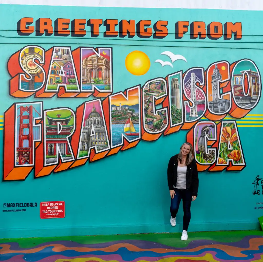 San Francisco Photo Spots. Standing in front of the Welcome to San Francisco sign in Fisherman's Wharf.