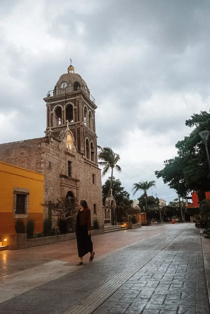 walking in front of the Loreto Mission