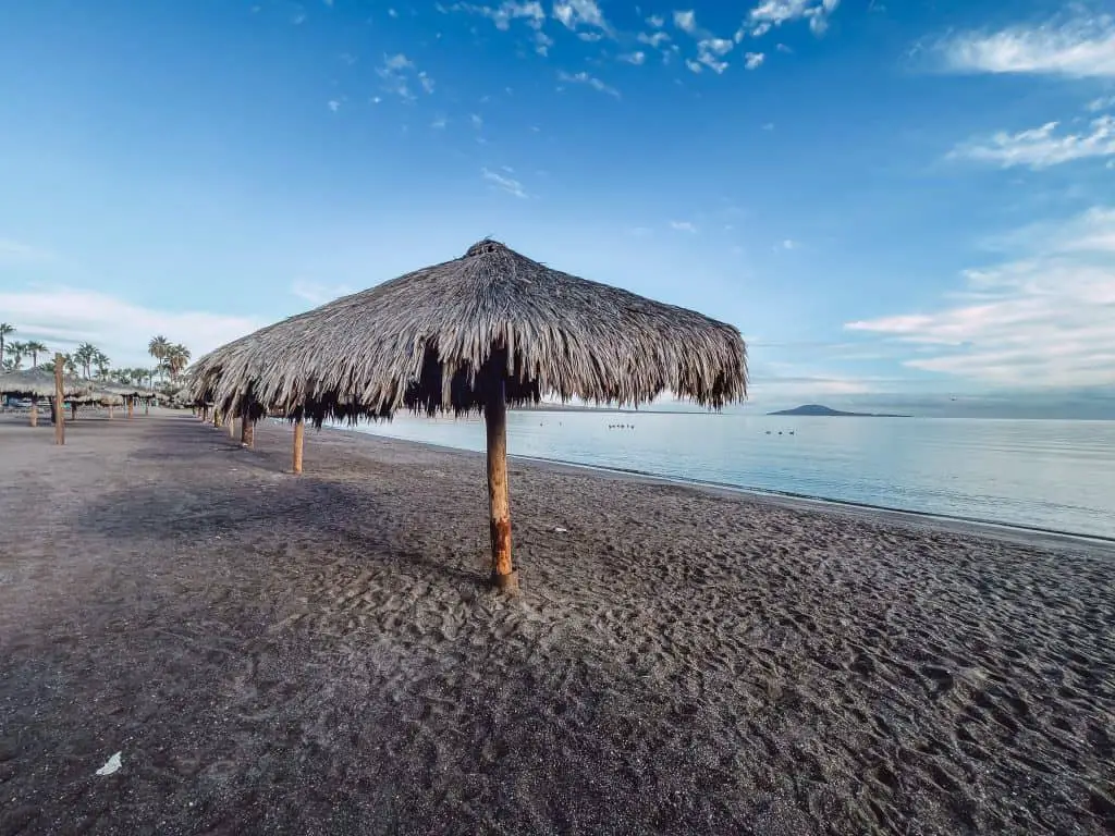 Palapas on La Darsena - one of the beaches in Loreto