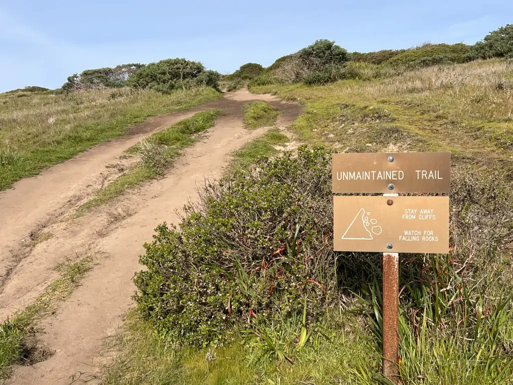 Unmaintained trail sign leading to the last half of the Tomales Point trail in Point Reyes National Seashore.