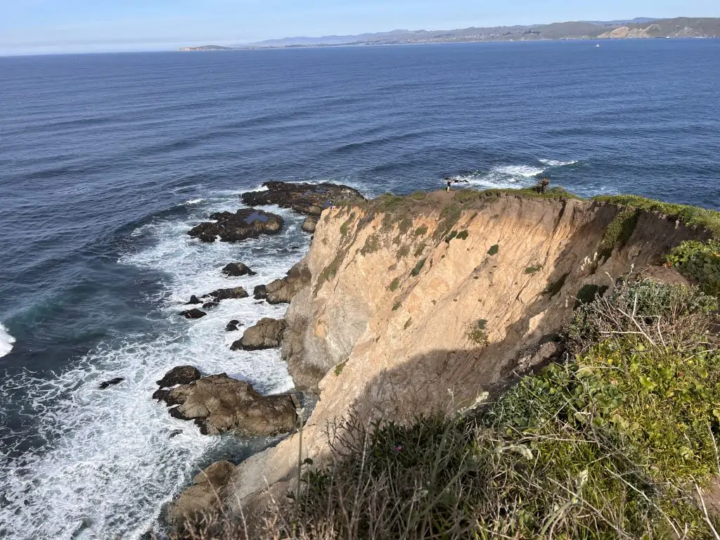 Rocky point extending into the Pacific Ocean of the Tomales Point trail.