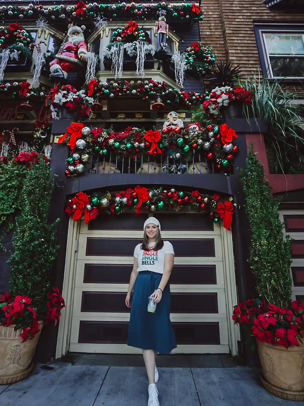 Standing in front of a house decorated for Christmas in San Francisco.