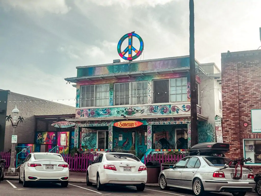 Samesun Ocean Beach hostel tie dye exterior.