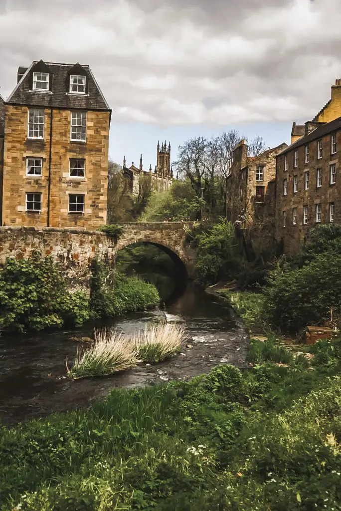 River flowing under a bridge in Dean's Village in Edinburgh, Scotland