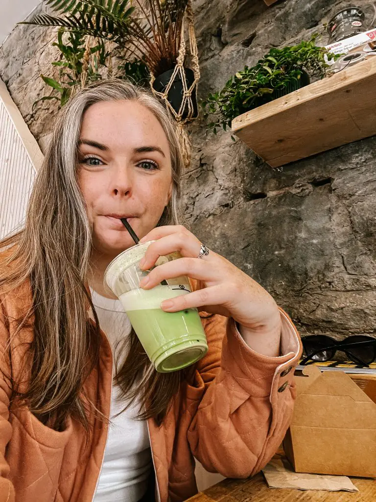 Me sipping matcha in the Milkman in Edinburgh, Scotland