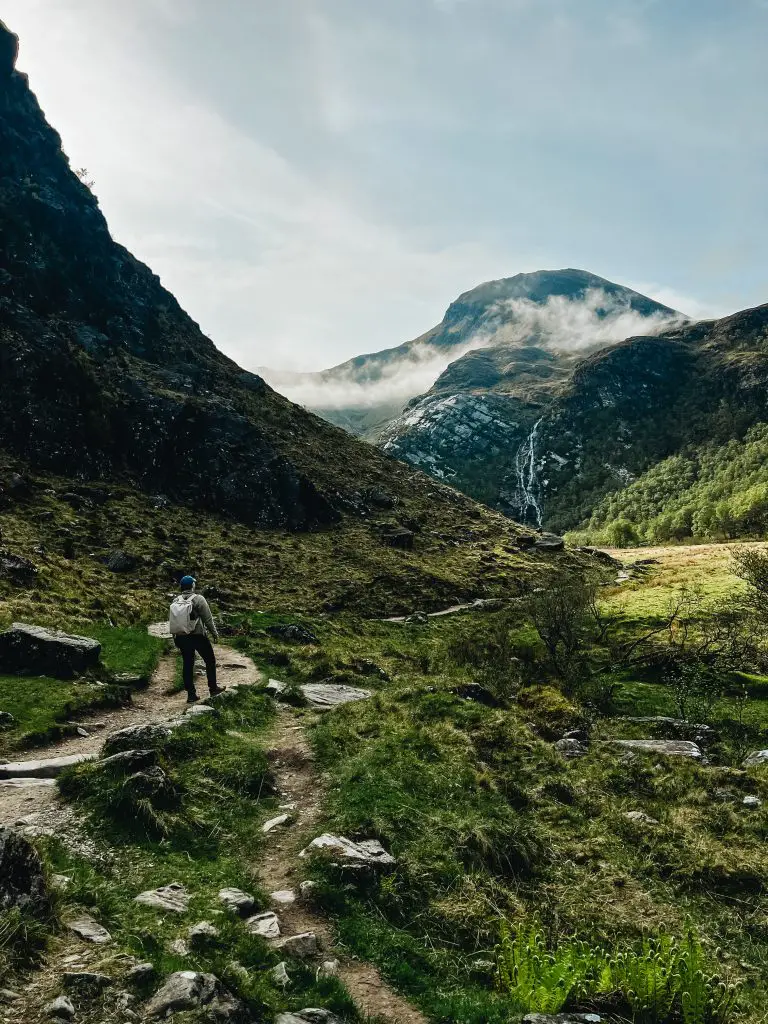 Me hiking the Steall Falls trail in Glencoe Scotland.