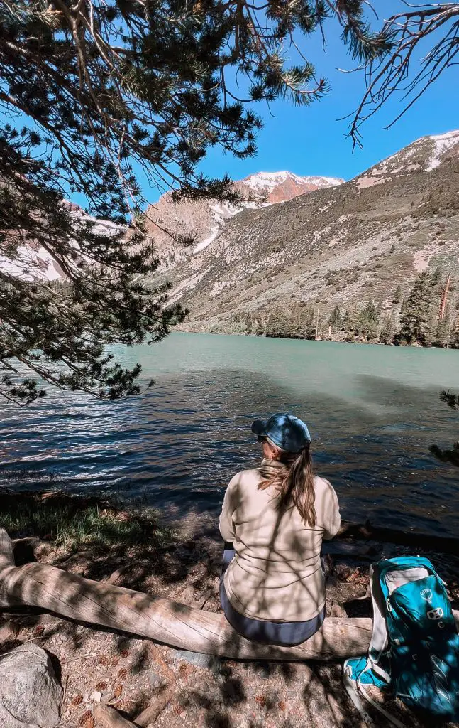 Me sitting next to Parker Lake after hiking the trail in Inyo National Forest.