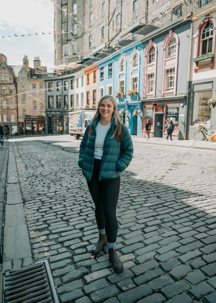 Me standing on Victoria Street in Edinburgh, Scotland.