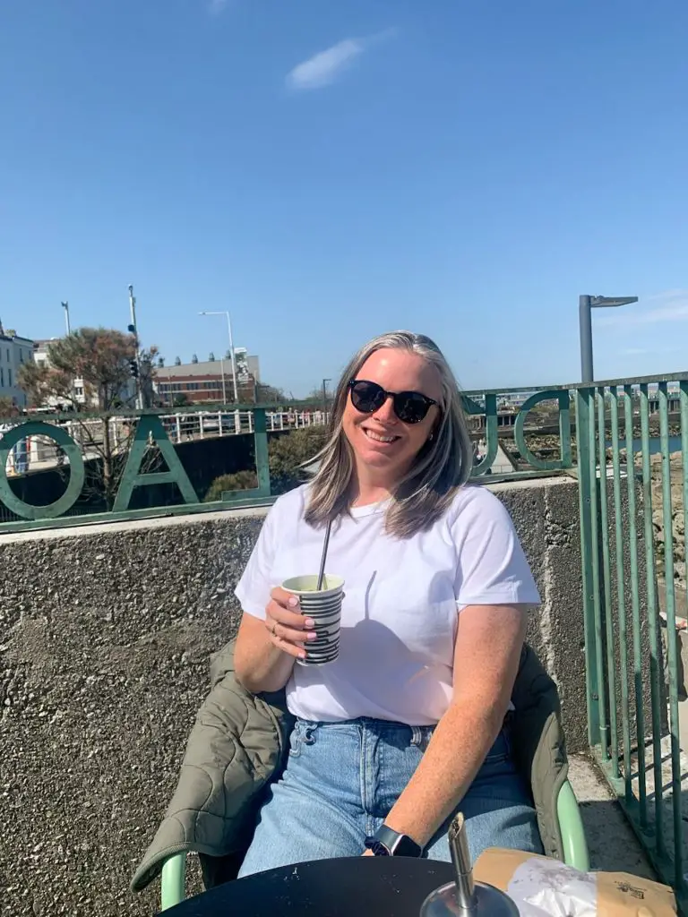 Drinking a matcha on a day trip to Dun Loaghaire in Dublin, Ireland.
