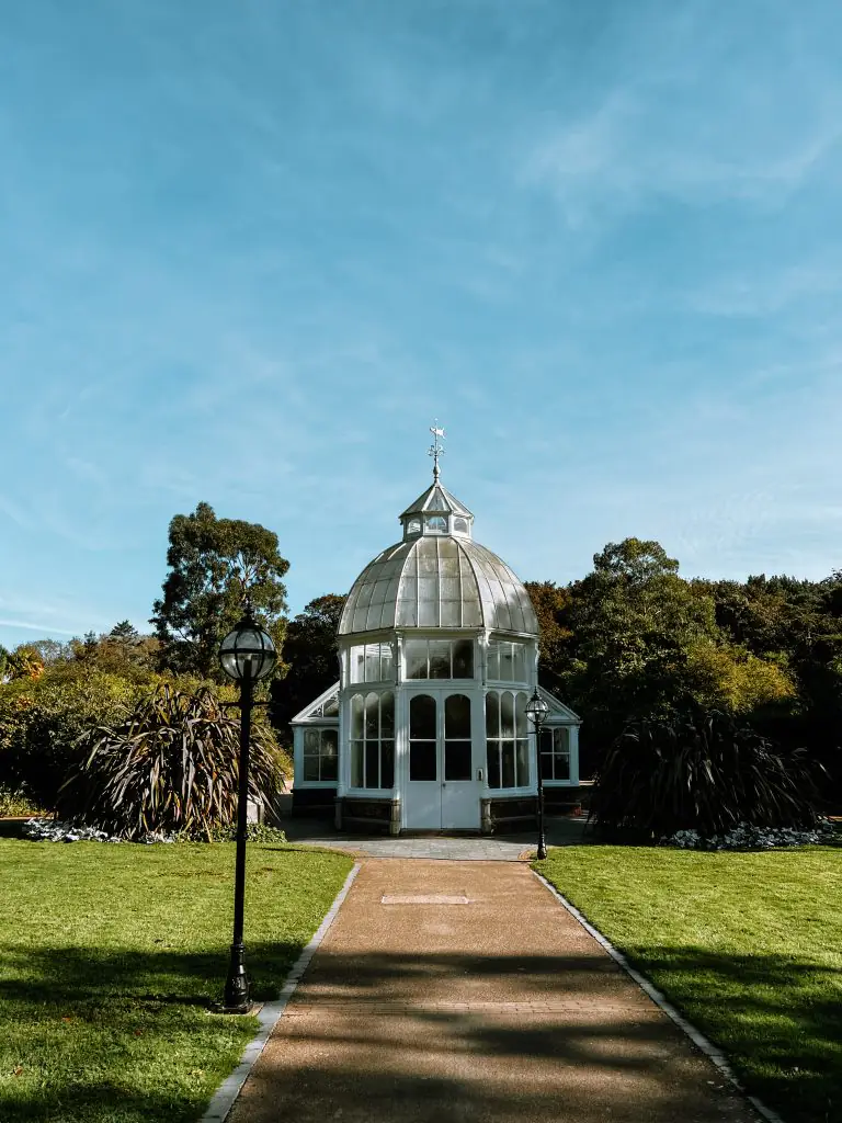 White building in a park in Malahide Ireland.