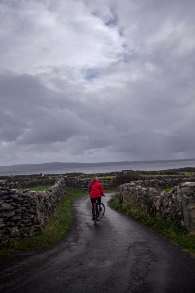 Riding a bike down the lane on the Aran Islands. 