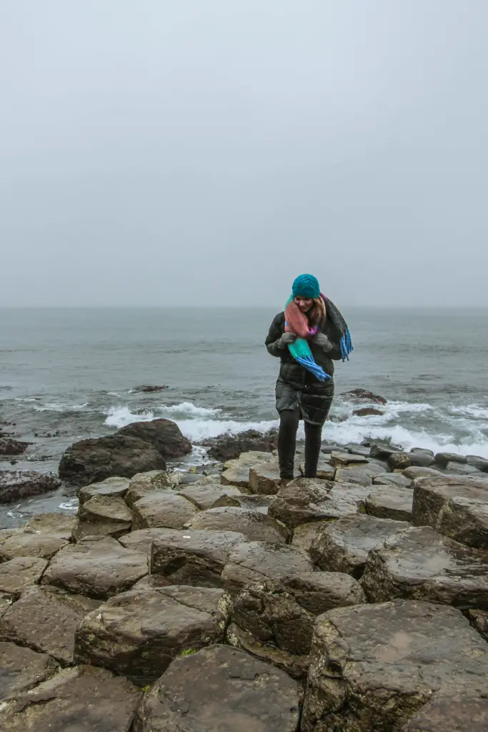 Walking on the stones of the Giant's Causeway in Northern Ireland.