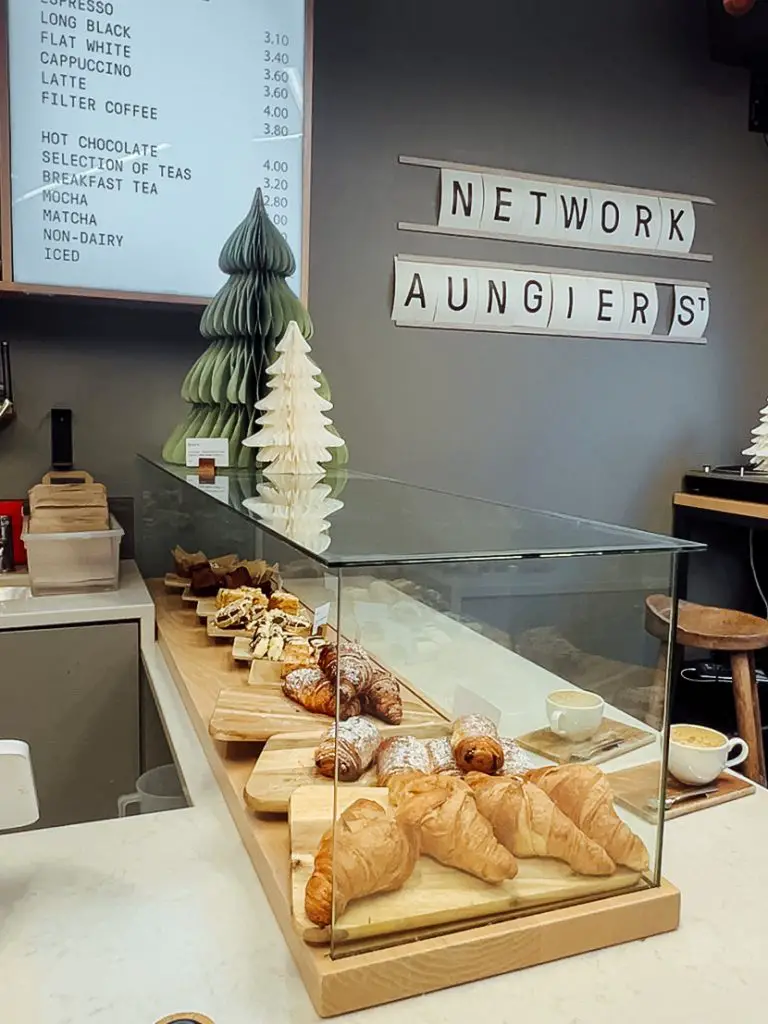 Network cafe pastry counter with menu in Dublin, Ireland. 