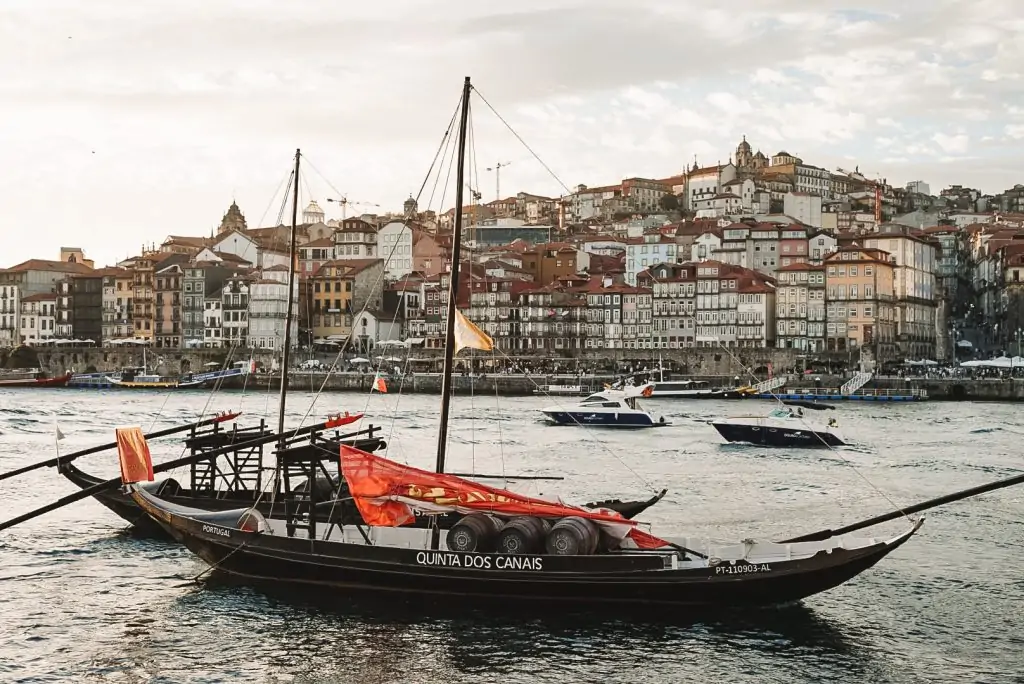 Riverfront with a boat in Porto, Portugal.