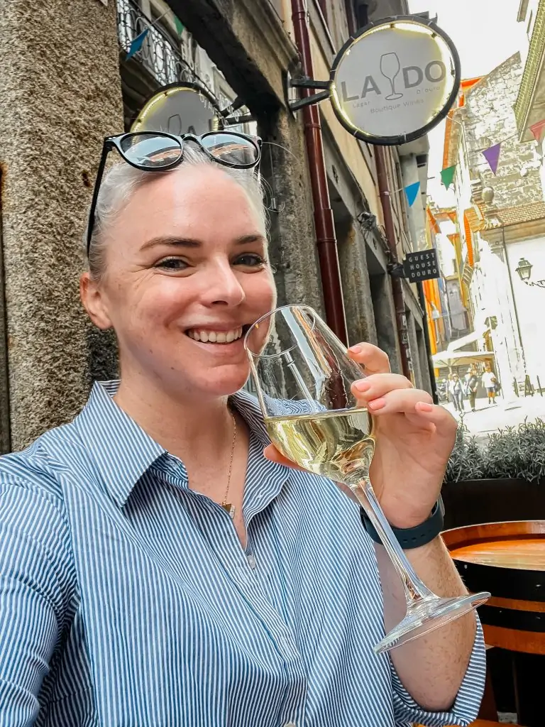 Me drinking wine at Lado wines in Porto, Portugal.