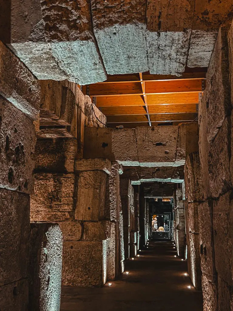 Underground tunnels at the Roman Colosseum at night.