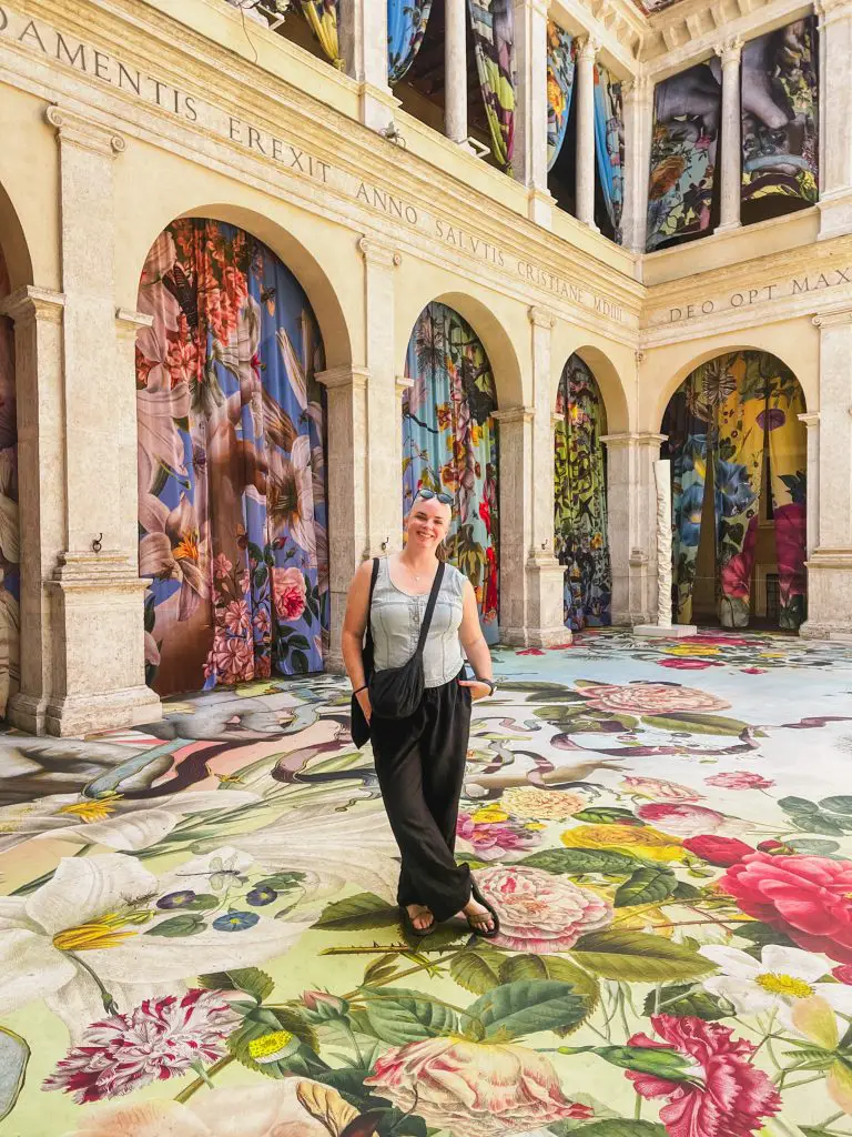 Standing in a flower exhibit in Rome in May.