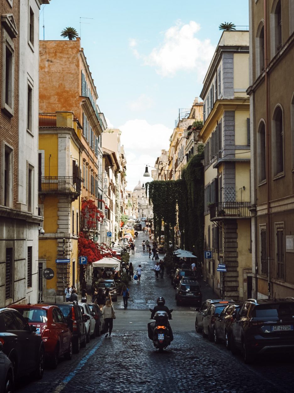 Ivy lined street in Monti, Rome, Italy.
