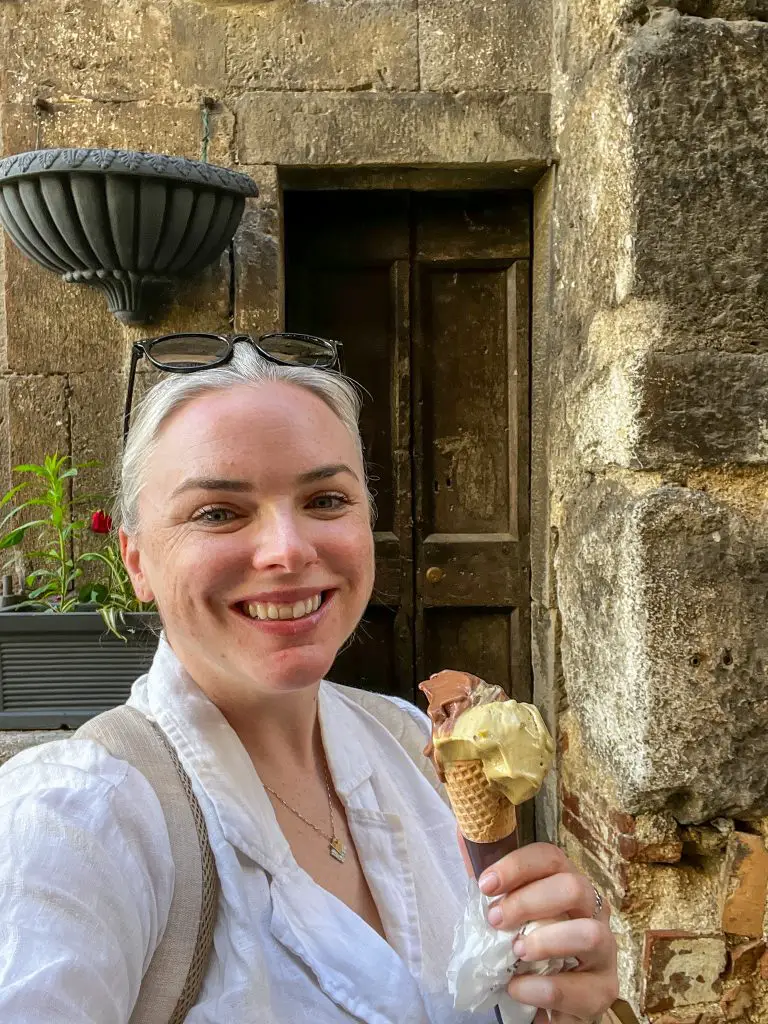 Enjoying pistacchio and chocolate gelato in Spoleto, Italy.