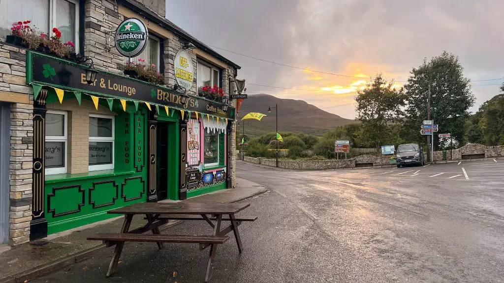 Green pub on a rainy day in County Donegal, Ireland.