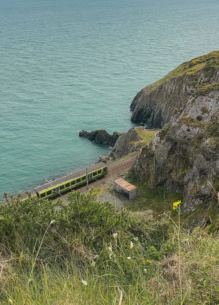 DART train running along the coast in Bray, Ireland.