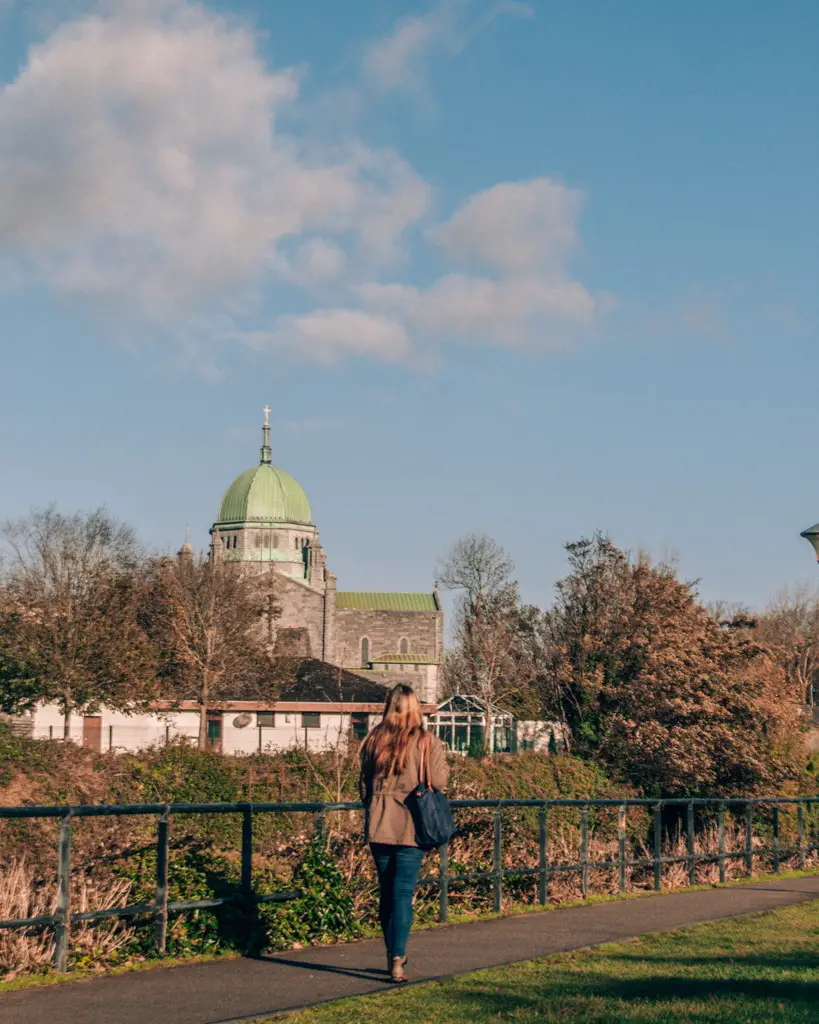 Me walking along Galway canals in front of Galway Cathedral in Ireland.