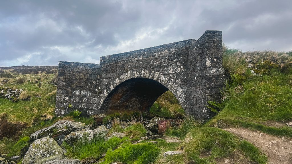 Stone bridge over water known as the PS I Love Your Bridge in Wicklow, Ireland.