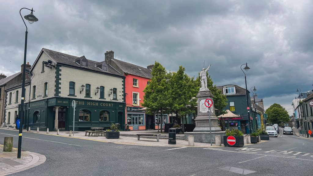 Storefronts of Main Street on a stormy day in Wicklow Town.